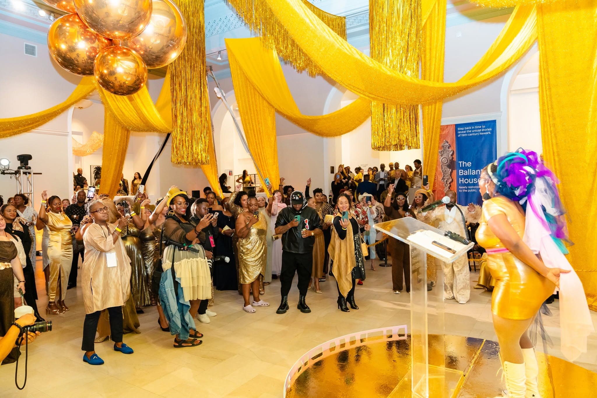 The Gold Ball featured performer Mia X lights up the stage during the Newark Arts Festival 2025 Opening Celebration