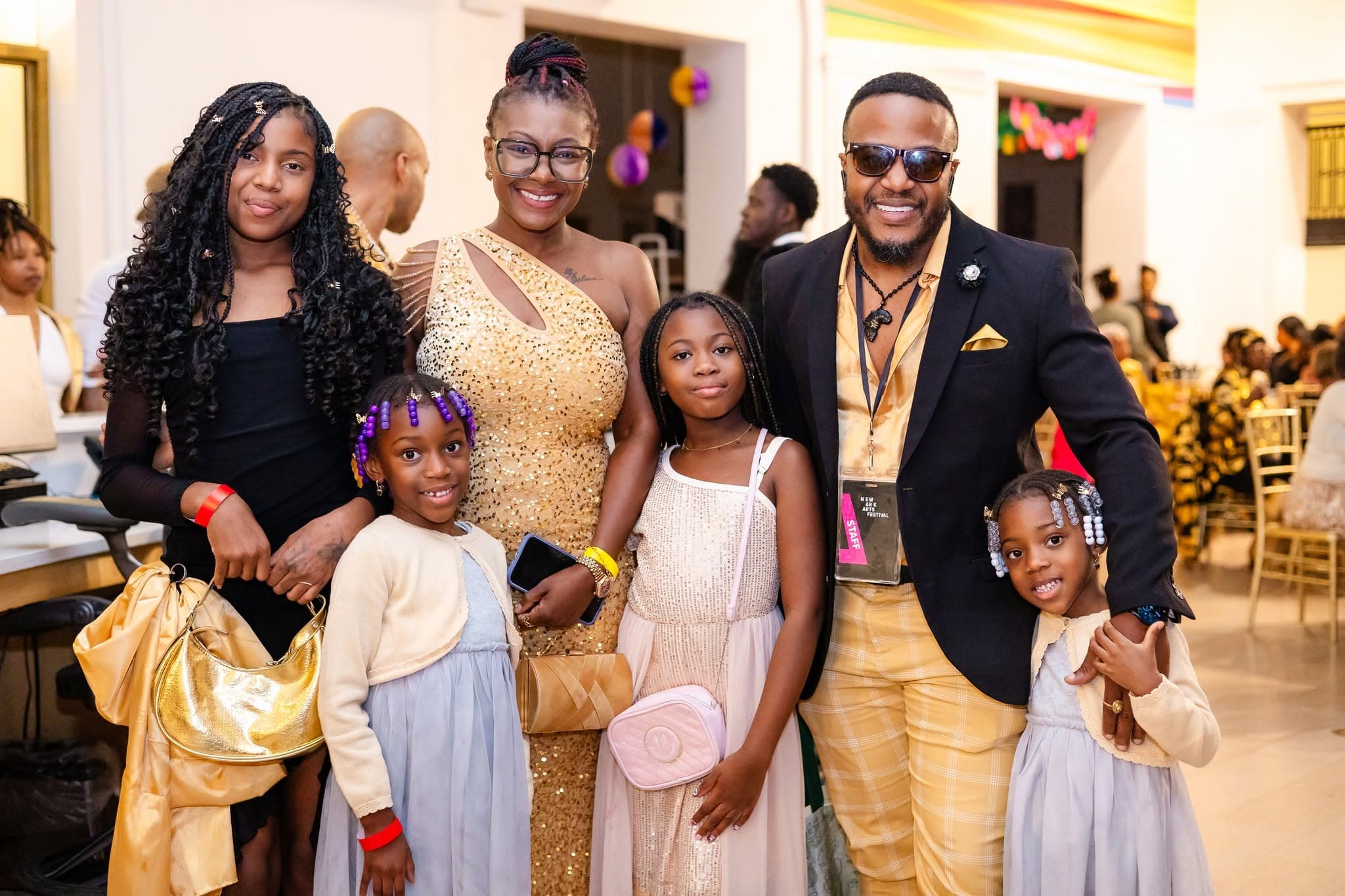 Newark family in attendance at The Gold Ball, Opening Night of the Newark Arts Festival 2025 at The Newark Museum Of Art